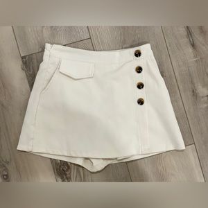 Cream corduroy skort.